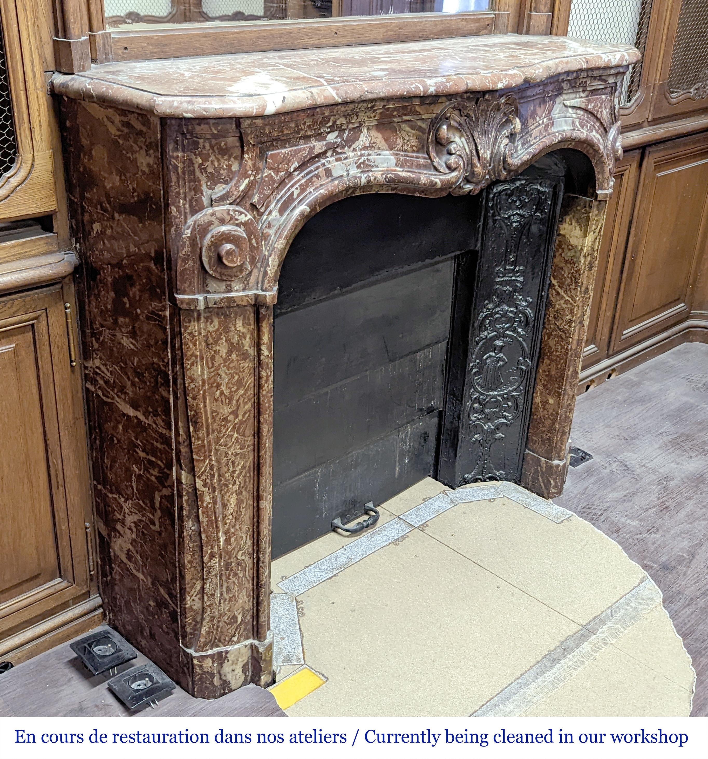 Louis XV style oak paneling and bookcase including a fireplace mantel. For Sale 1