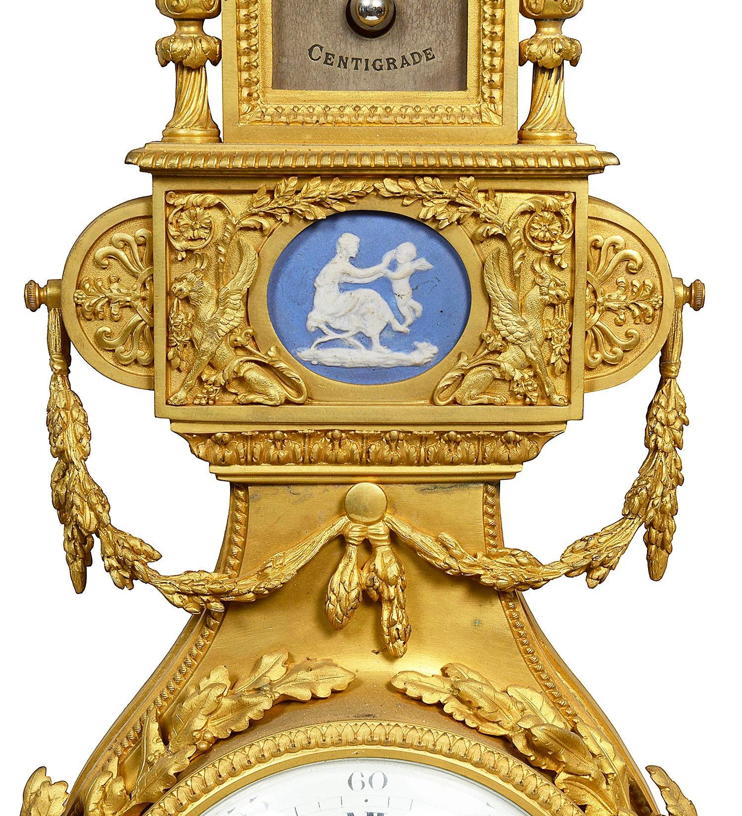 French Louis XV style Ormolu Cartel wall clock.