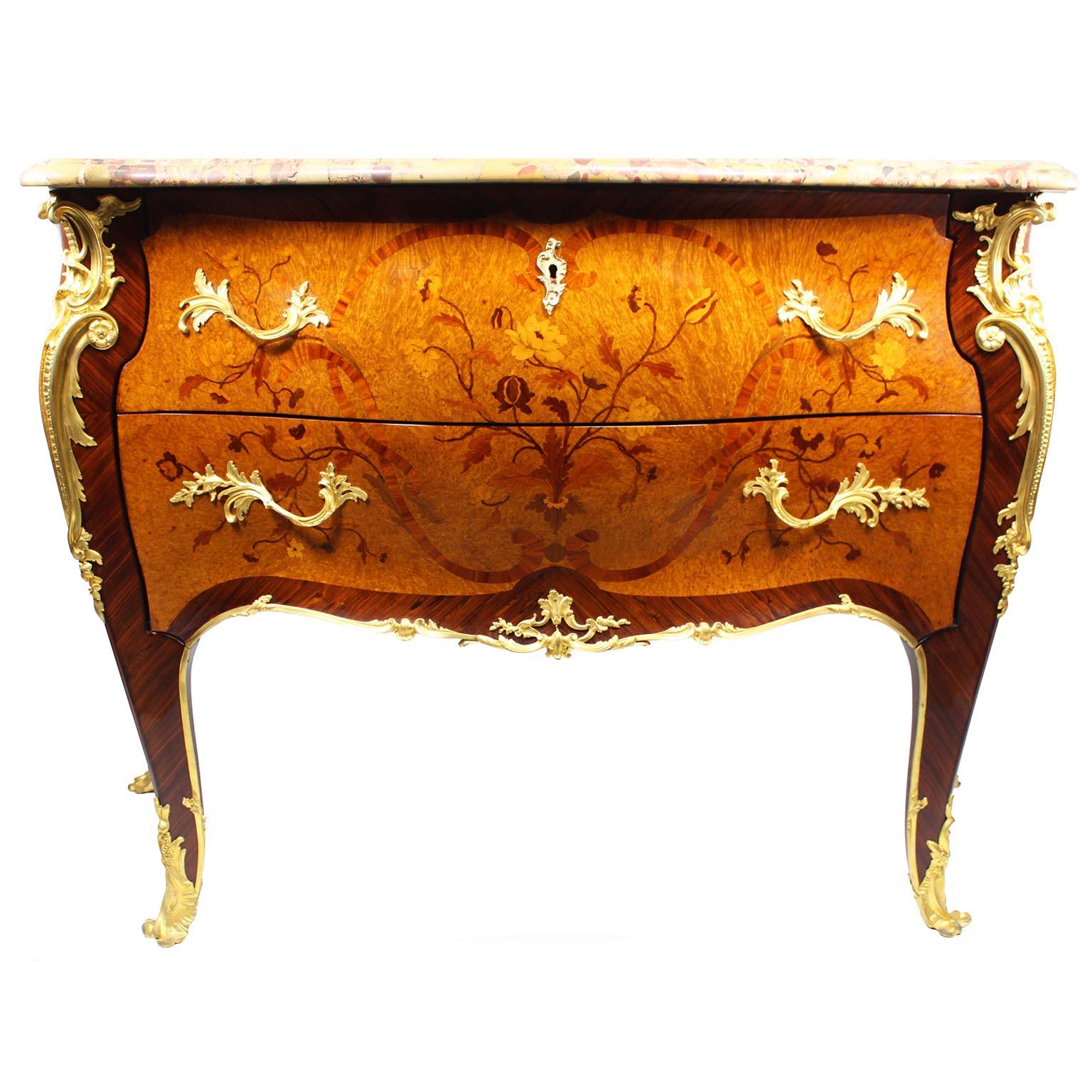 A very fine French 19th-20th century Louis XV style burr walnut, kingwood and satinwood floral marquetry and finely chased ormolu-mounted two-drawer bombé commode, attributed to François Linke (1855-1946), with a Brêche d'Alep marble top. The back