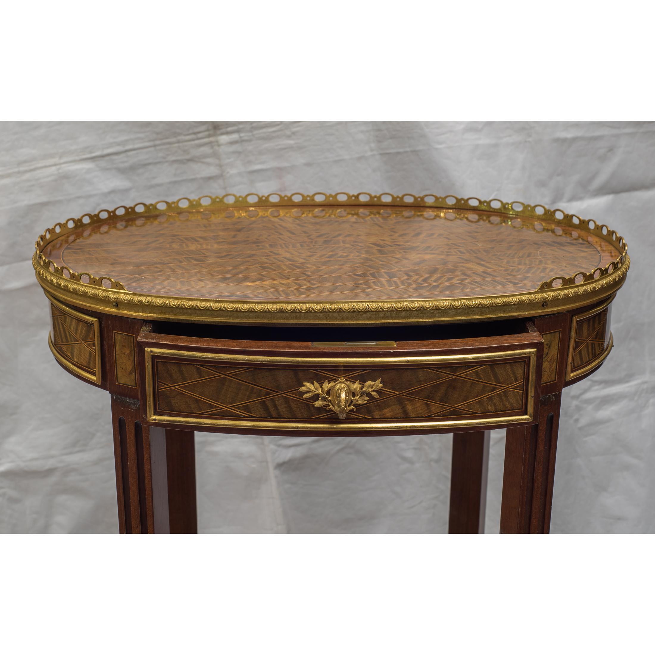 Louis XV-Style Ormolu-Mounted Inlaid Tulipwood and Mahogany Galleried Oval Table In Good Condition For Sale In New York, NY