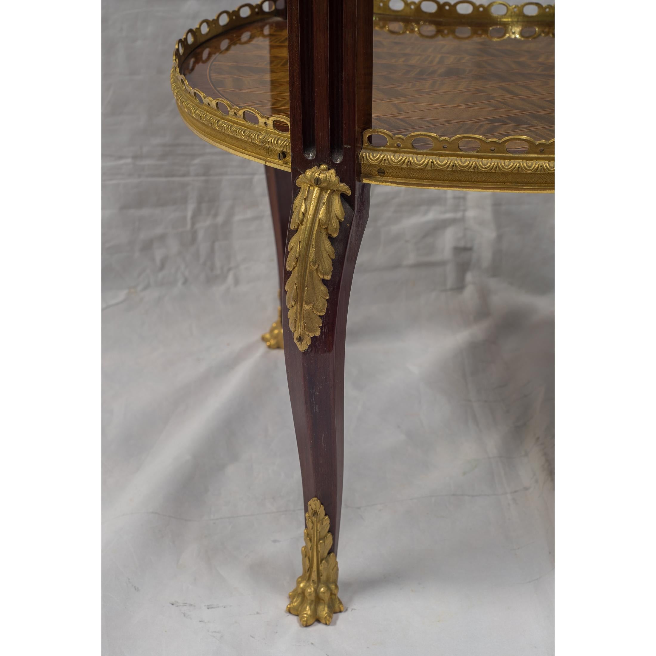 Bronze Louis XV-Style Ormolu-Mounted Inlaid Tulipwood and Mahogany Galleried Oval Table For Sale
