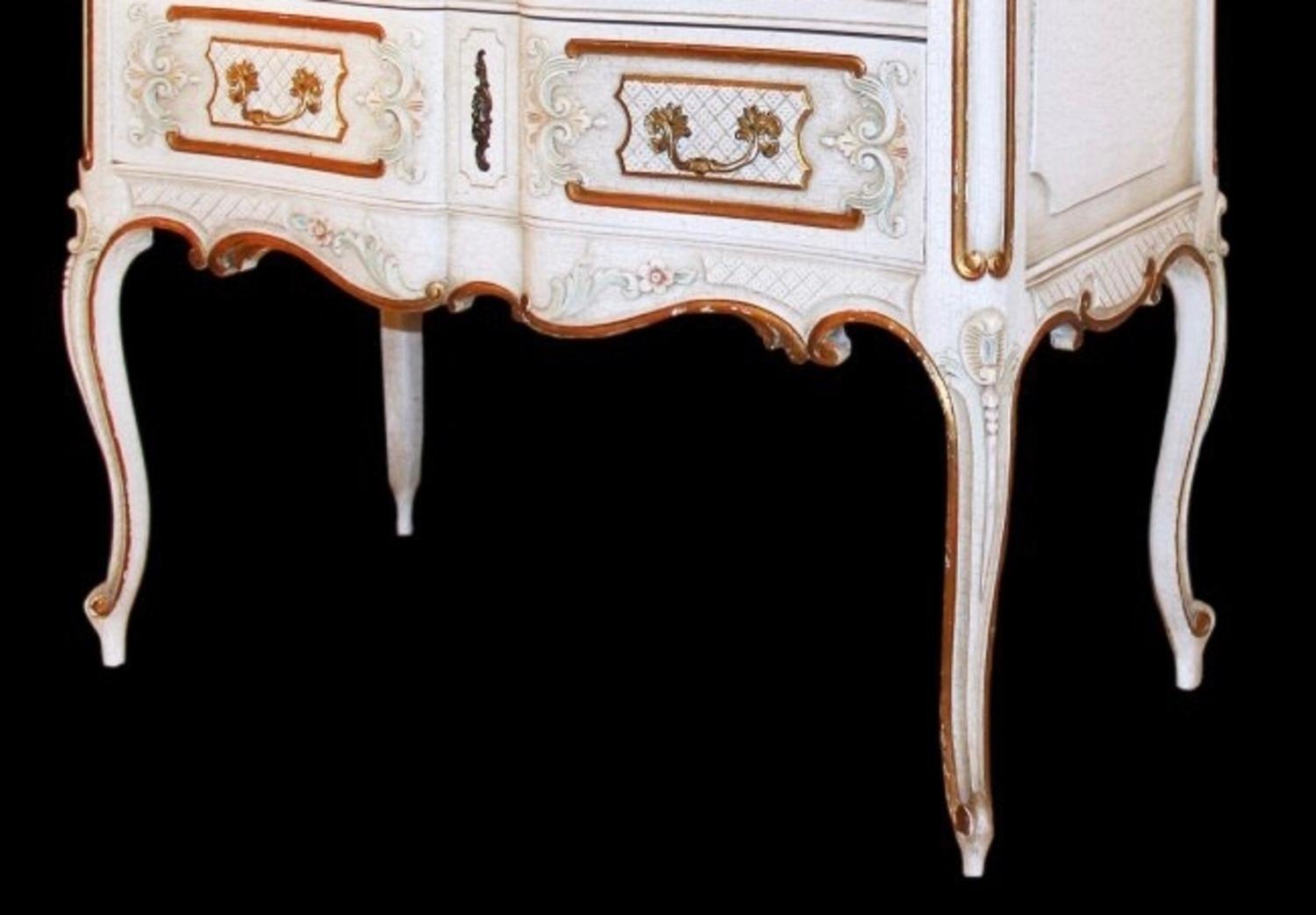Louis XV style painted commode
The rectangular serpentine fronted top above two long drawers, raised on cabriole legs
Measures: Height 33 inches
Width 35 1/2 inches 
Depth 17 1/2 inches.

 