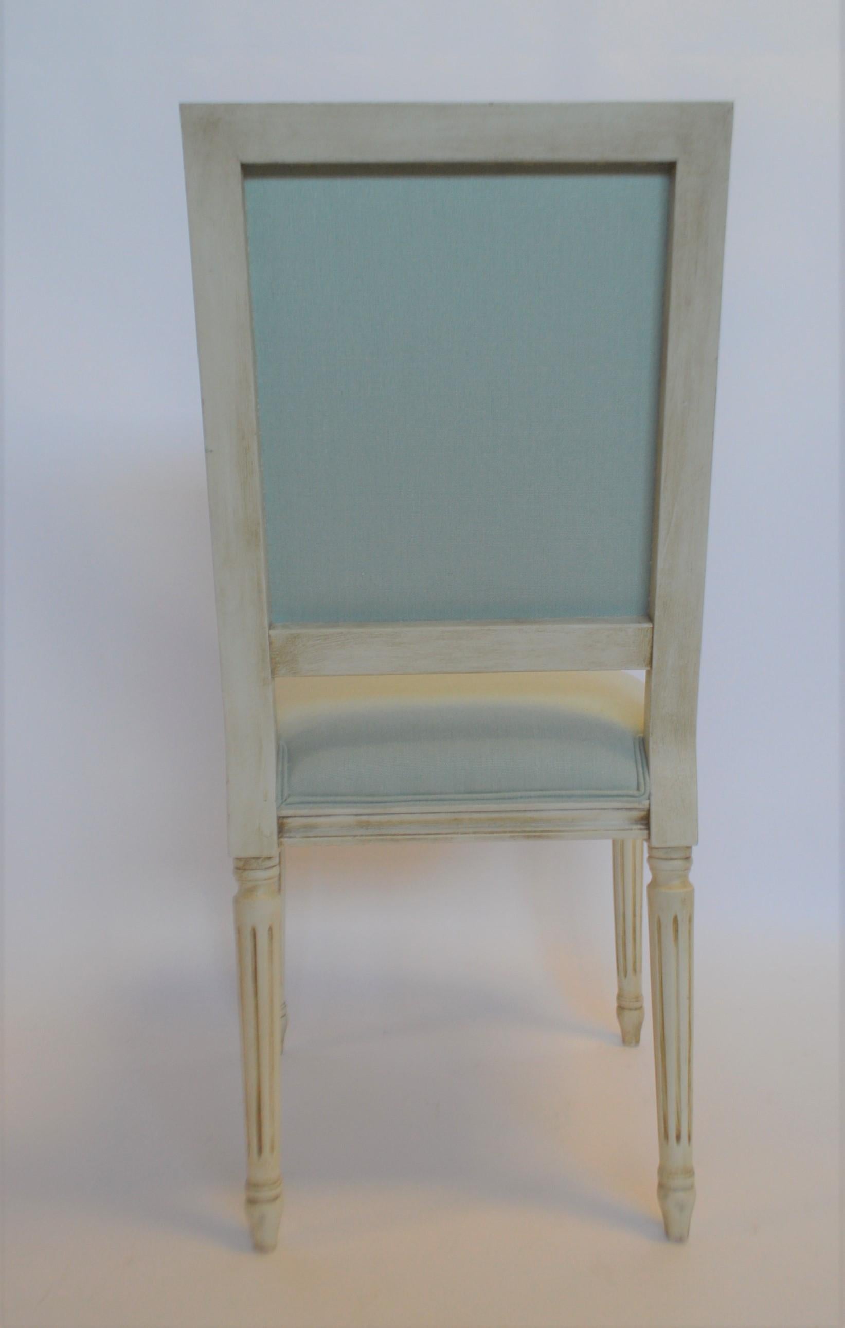 This Louis XVI style square back dining chair is one of our most popular, best seller dining chair for us. The frame is made in Italy of solid beech wood. The chair is painted here by our team of excellent and talented artisan painters. This chair