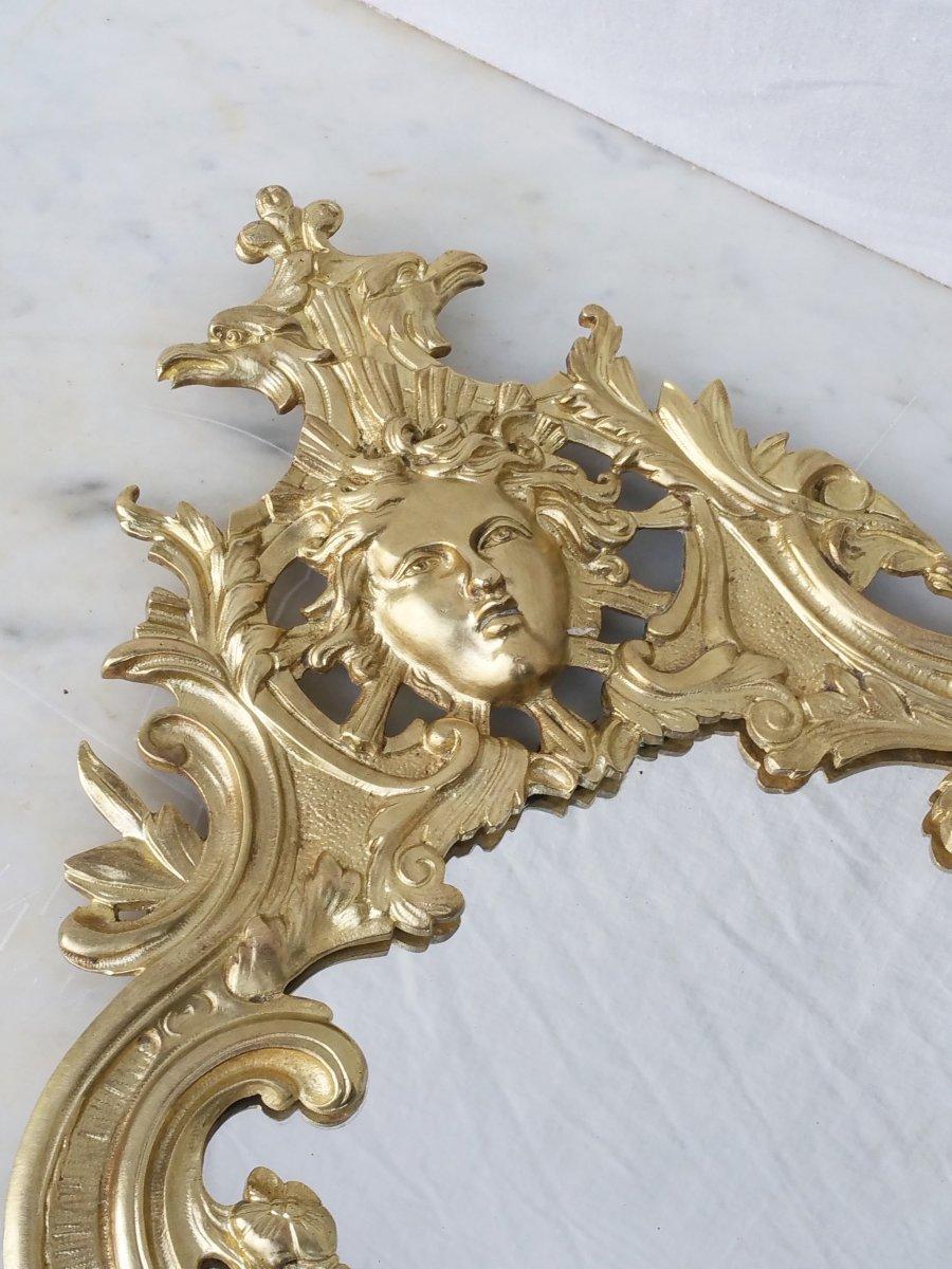 Louis XV style beautiful pair of gilt bronze mirrors, Napoleon III era.
Moldings nicely decorated with a caryatid on the upper central part and a chimera on the bottom part, mirror in an excellent condition.