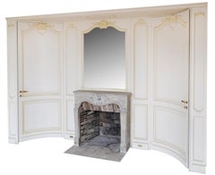 Louis XV style paneled room with 18th century stone fireplace