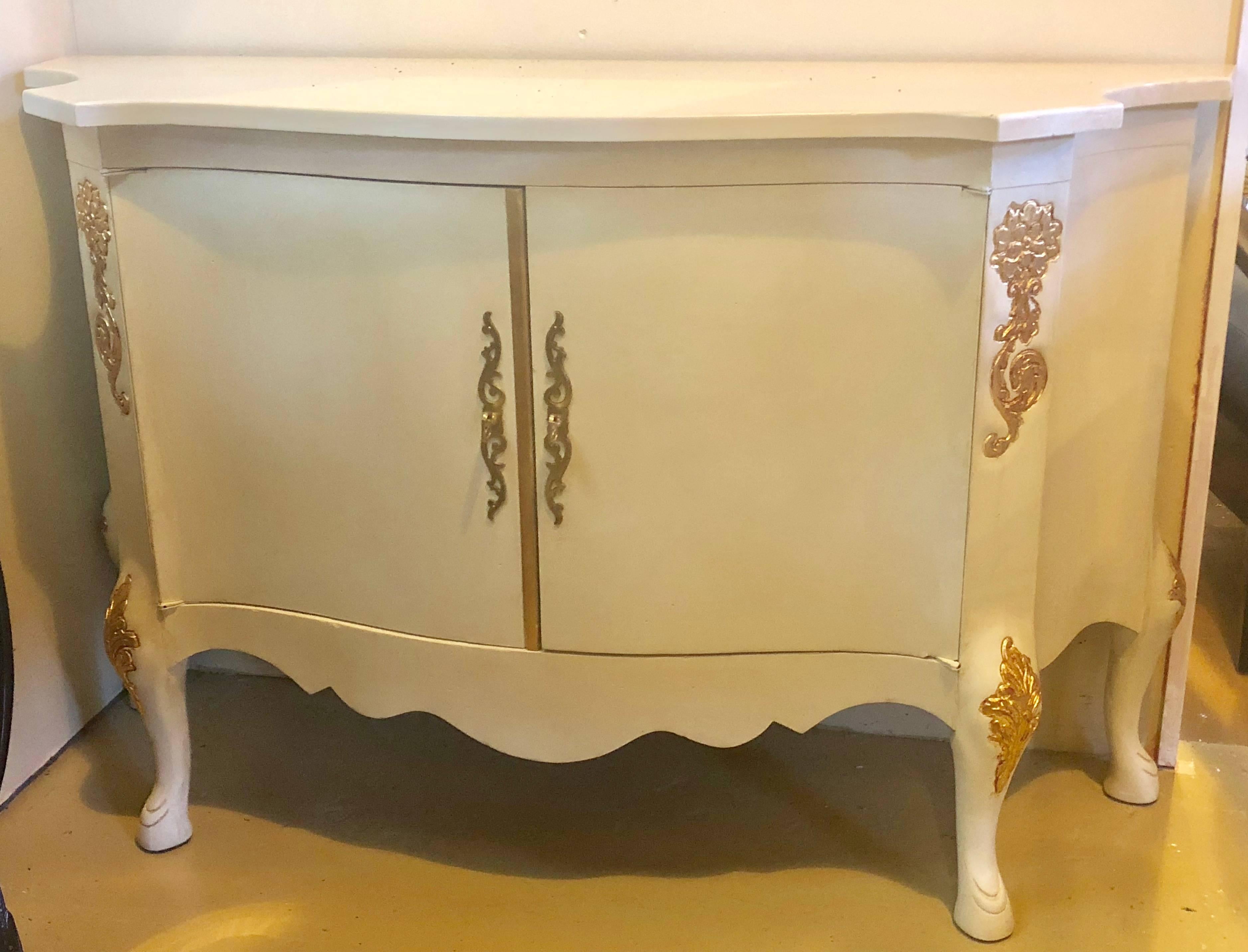 Louis XV style parcel-gilt and paint decorated two-door cabinet server sideboard.