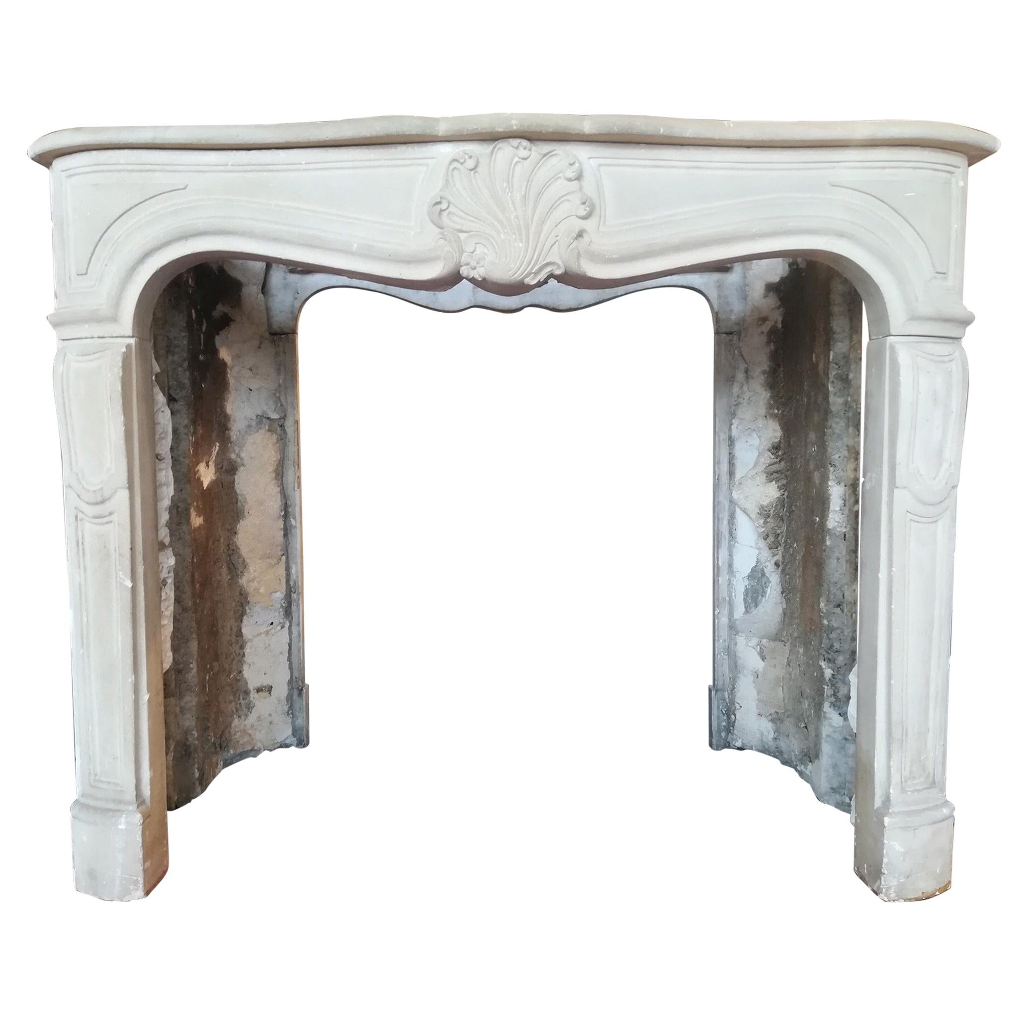 Louis XV Style, Parisian Fireplace Mantel Made in Clamart Stone, 20th Century For Sale