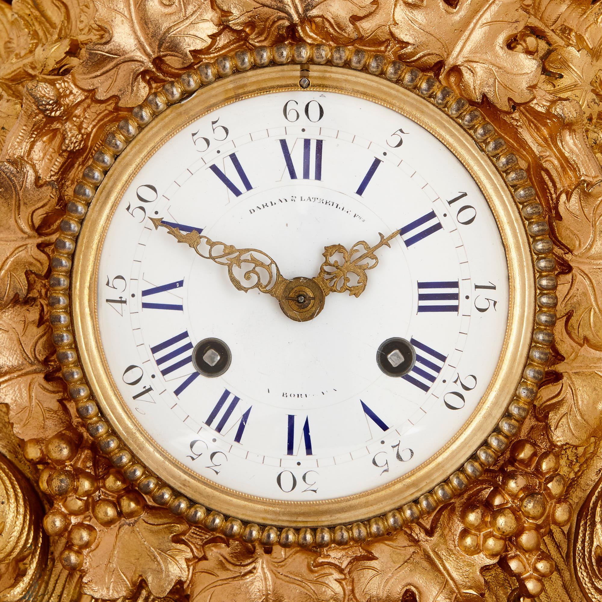 French Louis XV Style Patinated and Gilt Bronze Mantel Clock