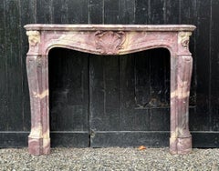 Cheminée en marbre fleur de pêcher de style Louis XV, vers 1880