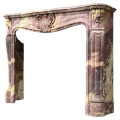Cheminée en marbre fleur de pêcher de style Louis XV, vers 1880