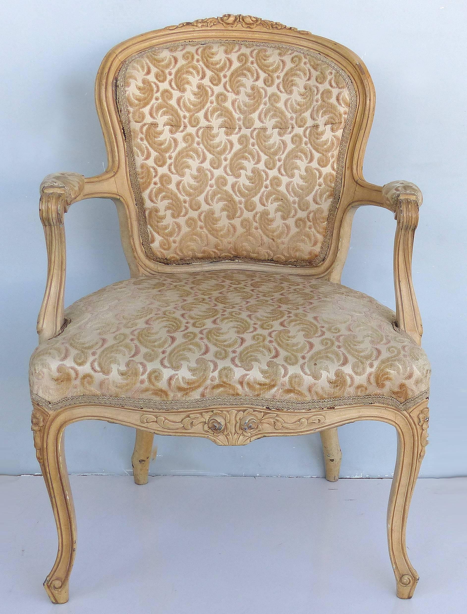 Louis XV Style Provincial Fauteuil Armchairs with Velvet Upholstery, Pair

Offered for sale are a late 19th-early 20th century pair of Louis XV style French provincial fauteuil armchairs. Both chairs show signs of age.
Measure: Seat, 17
