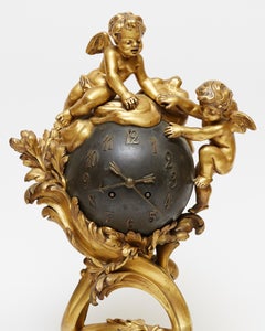 Louis XV Style Rouge Marble and Gilt Bronze Mantel Clock and Candelabra