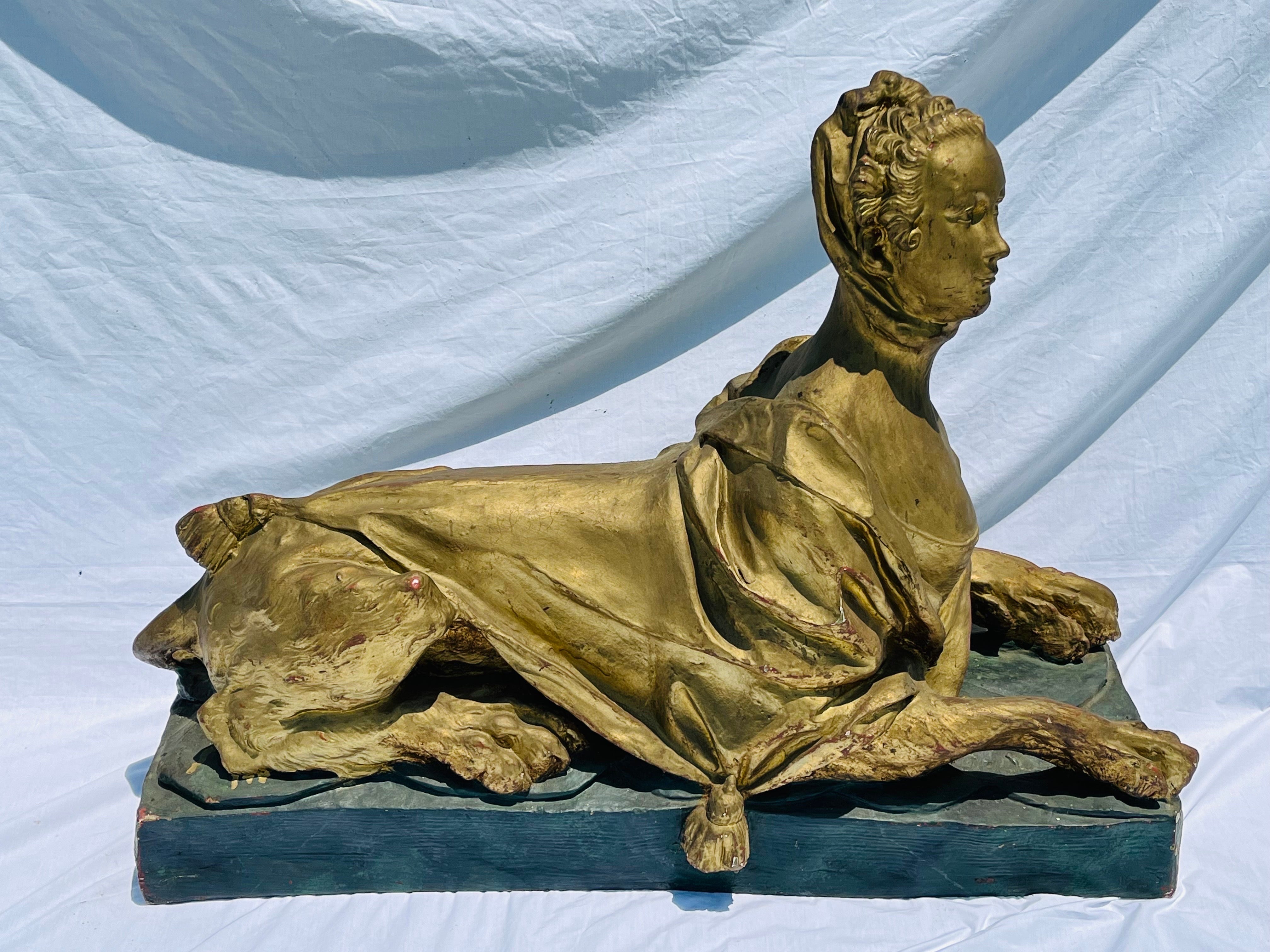 A (possibly) mid 20th Century, monumental in scale at three and a half feet, Louis XV style sculpture depicting Madame de Pompadour as Sphinx. The material poses a bit of a query as I am unsure as to its origins - perhaps papier mache with the