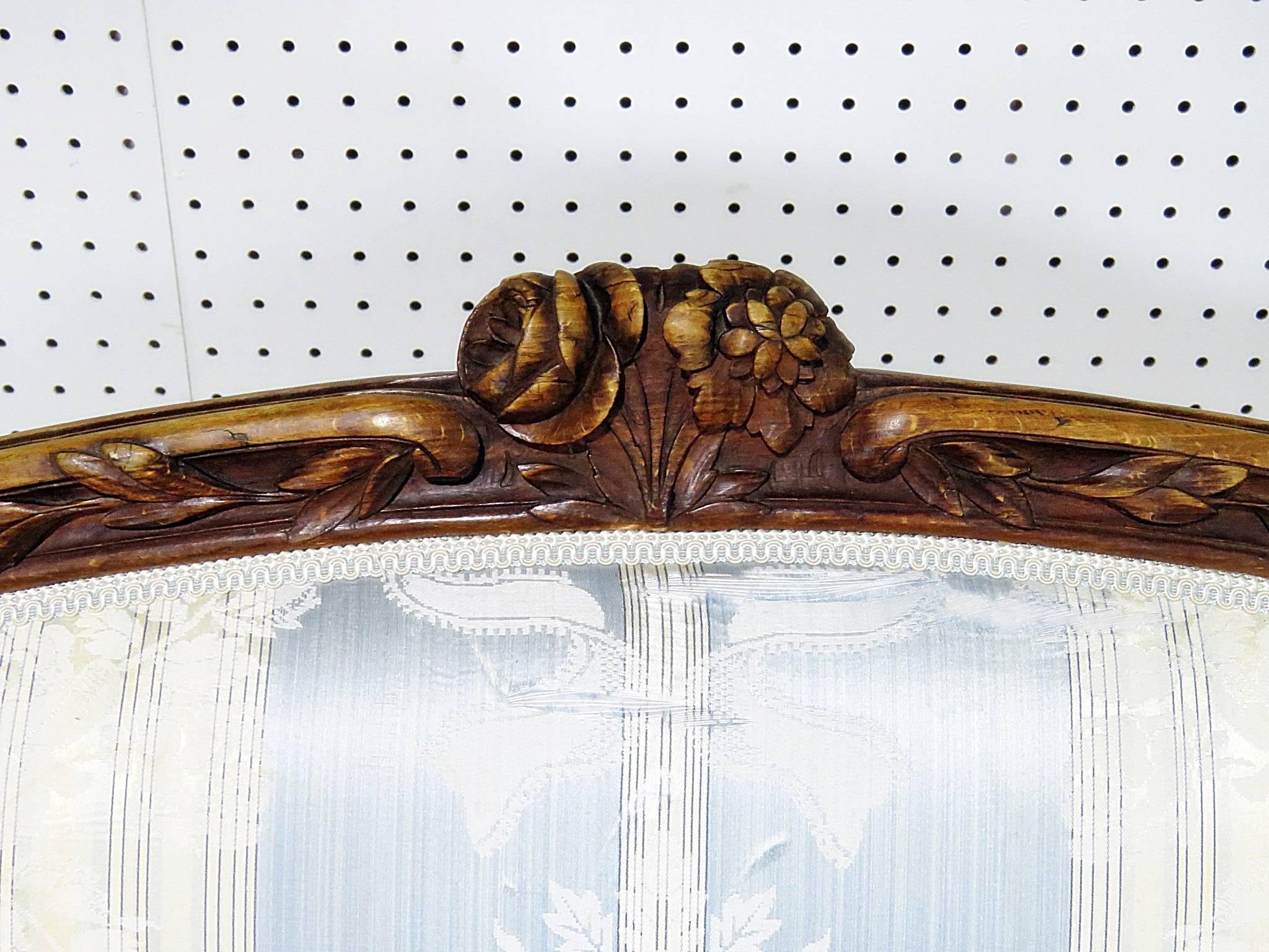 French Louis XV style walnut settee.