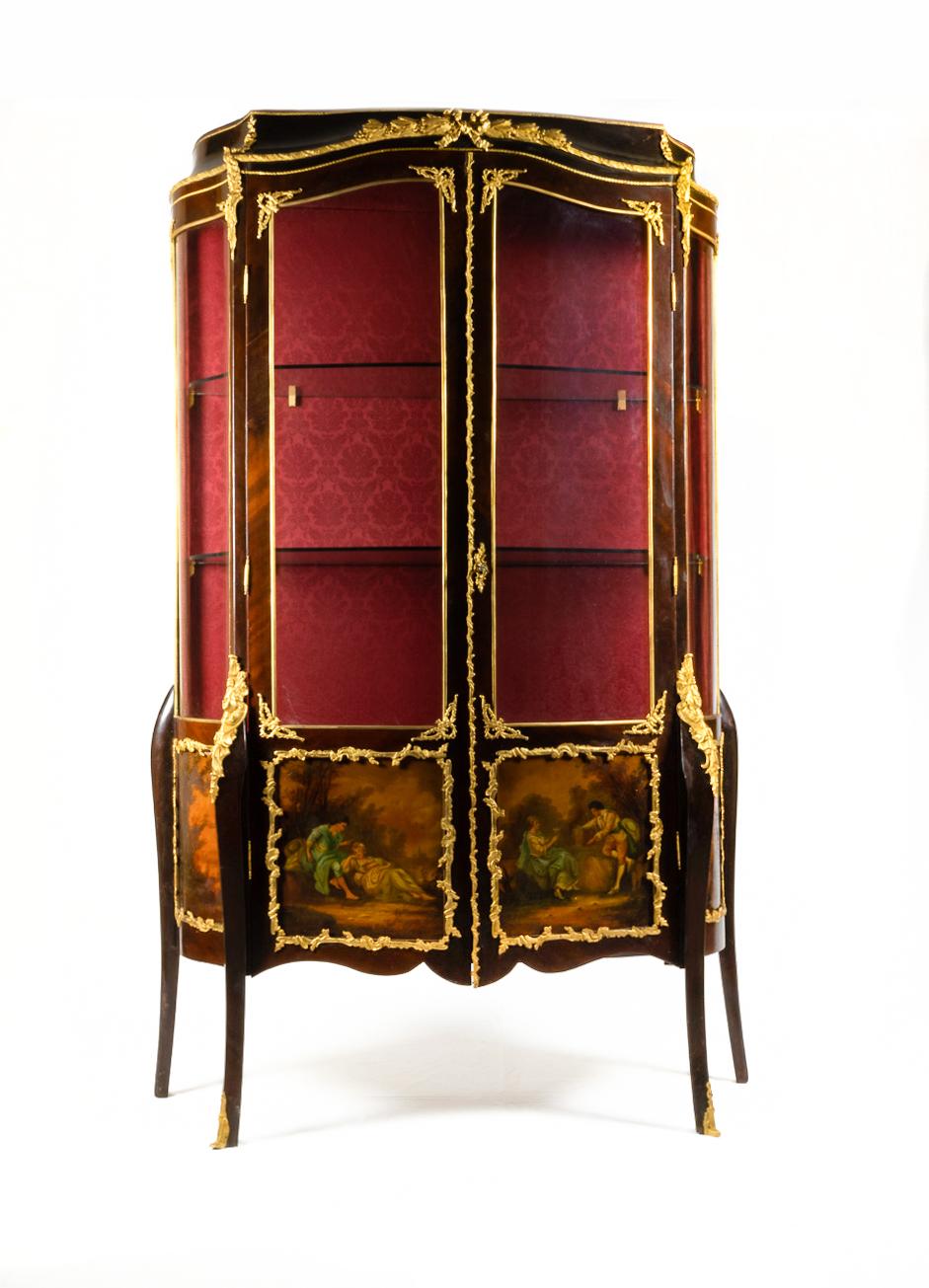 A stunning Vernis Martin vitrine cabinet, glazed paneled doors with painted gallant scenes and exquisite ormolu mounts. 

Four beautiful hand painted panels “H . Martin “ signed by the family descendants of the Martin brothers (in the court of Louis