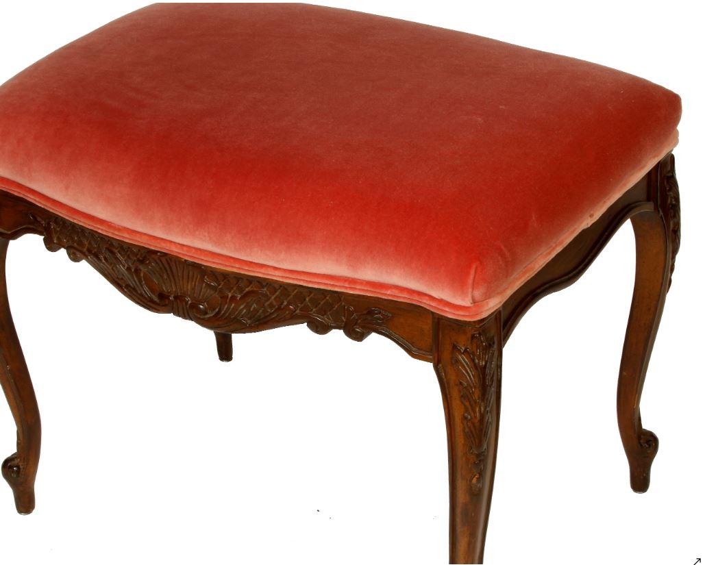 Lois XV style upholstered walnut bench in rose colored velour.