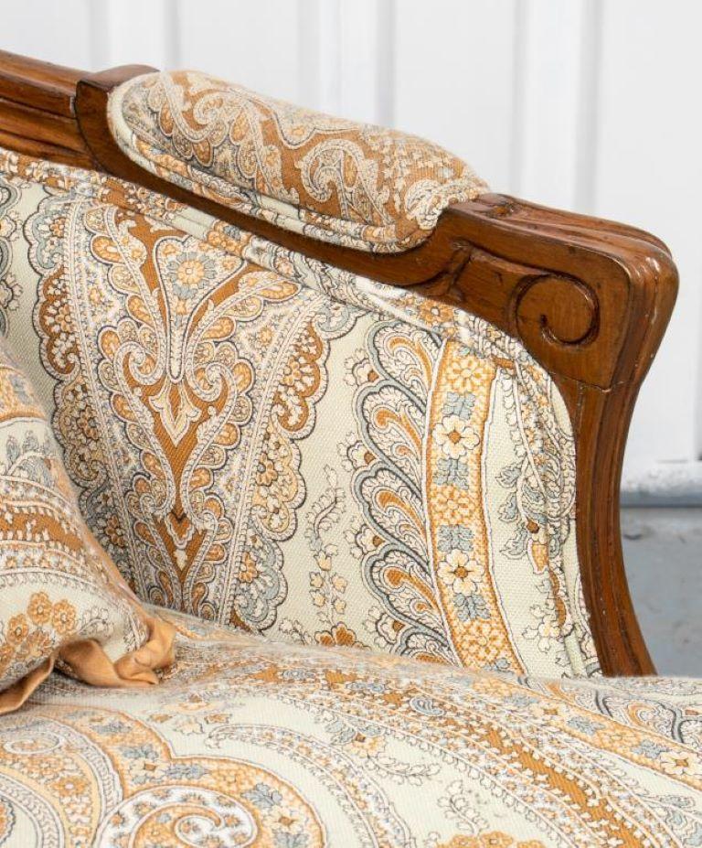 Louis XV style bergère, the carved frame upholstered with paisley fabric. 

Dealer: S138XX