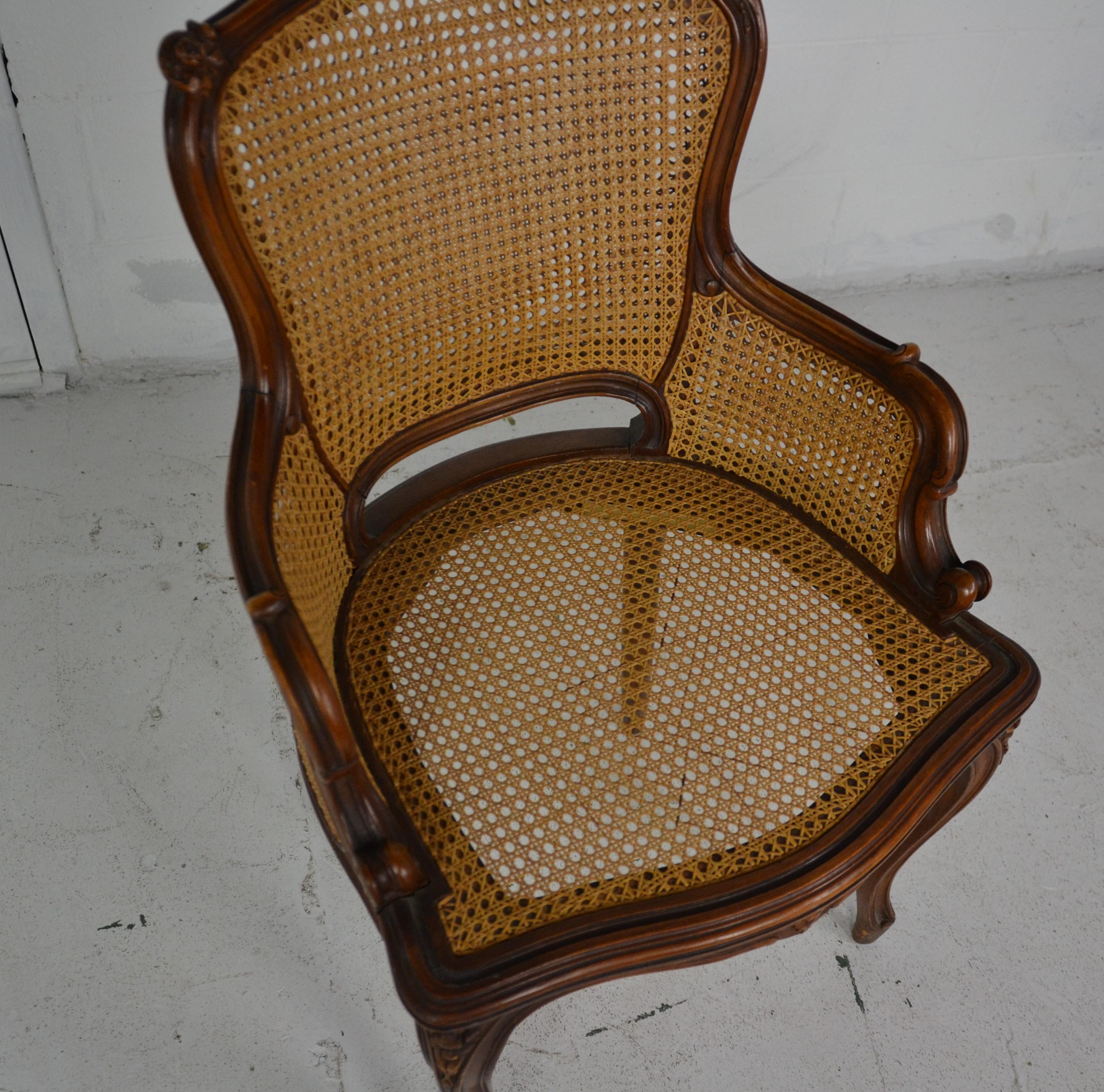 Louis XV style vanity chair. The seat and the back are cane.