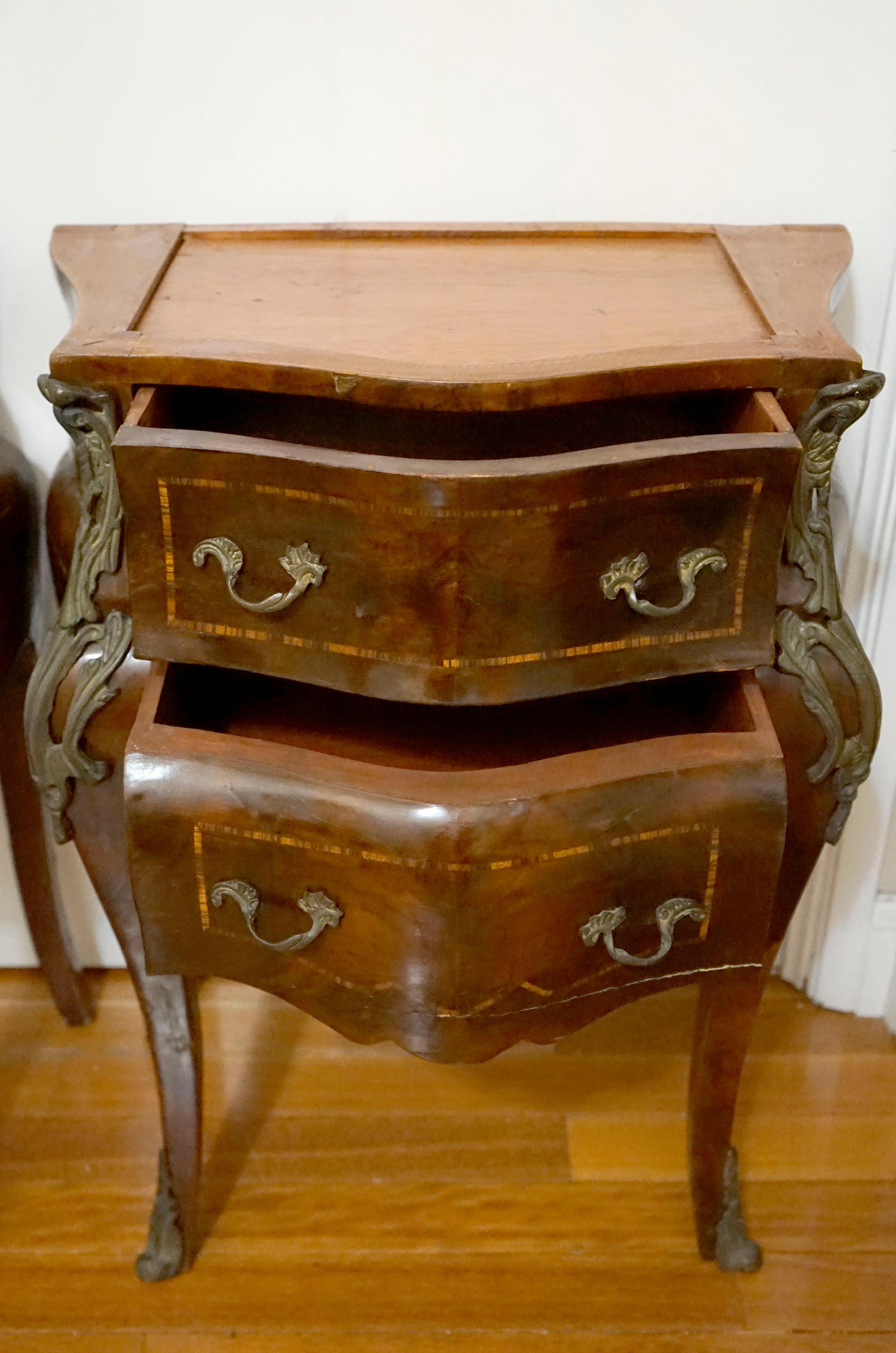 This pair of French style Louis XV nightstands are spectacular. The silhouette is beautiful with the elegant legs that rest on 
