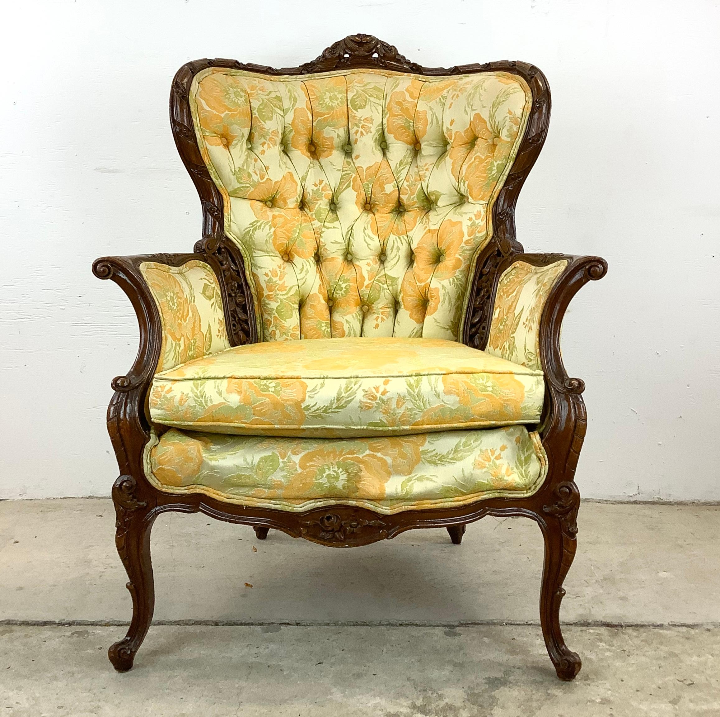 Nestle into the grandeur of yesteryear with this Louis XV-style wing chair, a luxurious ode to early 20th-century craftsmanship. This wing chair, with its solid wood frame and intricate carvings, showcases the opulent design of the era, adding a