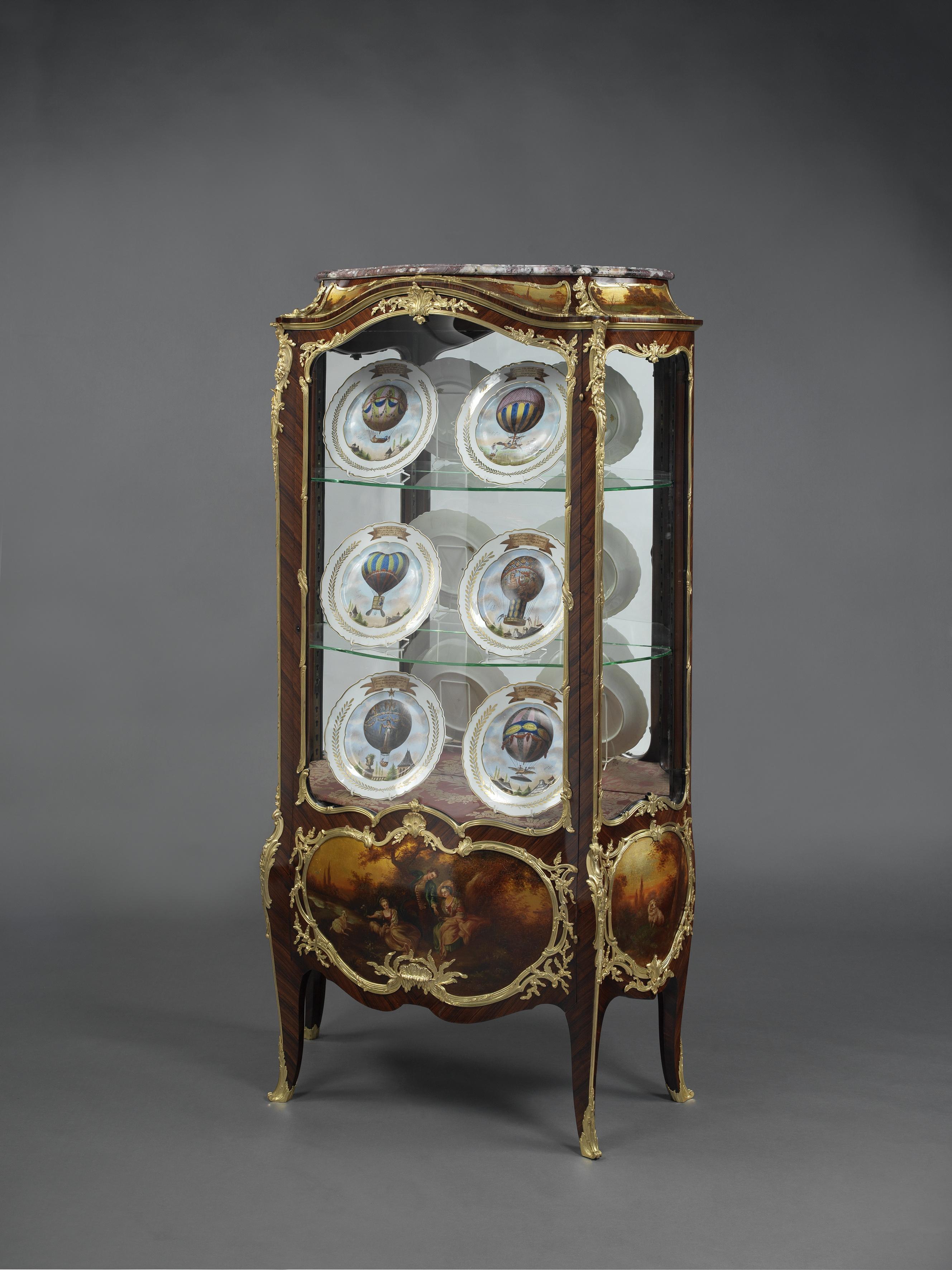 A Fine Louis XV Style Gilt-Bronze Mounted Bombé Vitrine With Vernis Martin Panels, by François Linke.

French, Circa 1900. 

Signed 'F. Linke' to one bronze mount. 
The reverse of the bronze mounts stamped 'FL'. 

Variation of Index No. 103 -