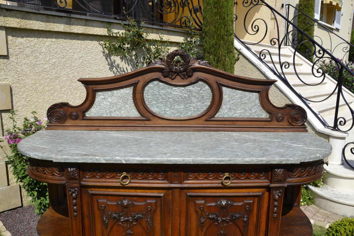 Walnut cabinet style Louis XVI with marble on the top and on the credenza. There are 2 doors and 4 drawers. Good condition.
French work of the 19th Century, Manufacturing Faubourg Saint Antoine à Paris (stamp to the back).