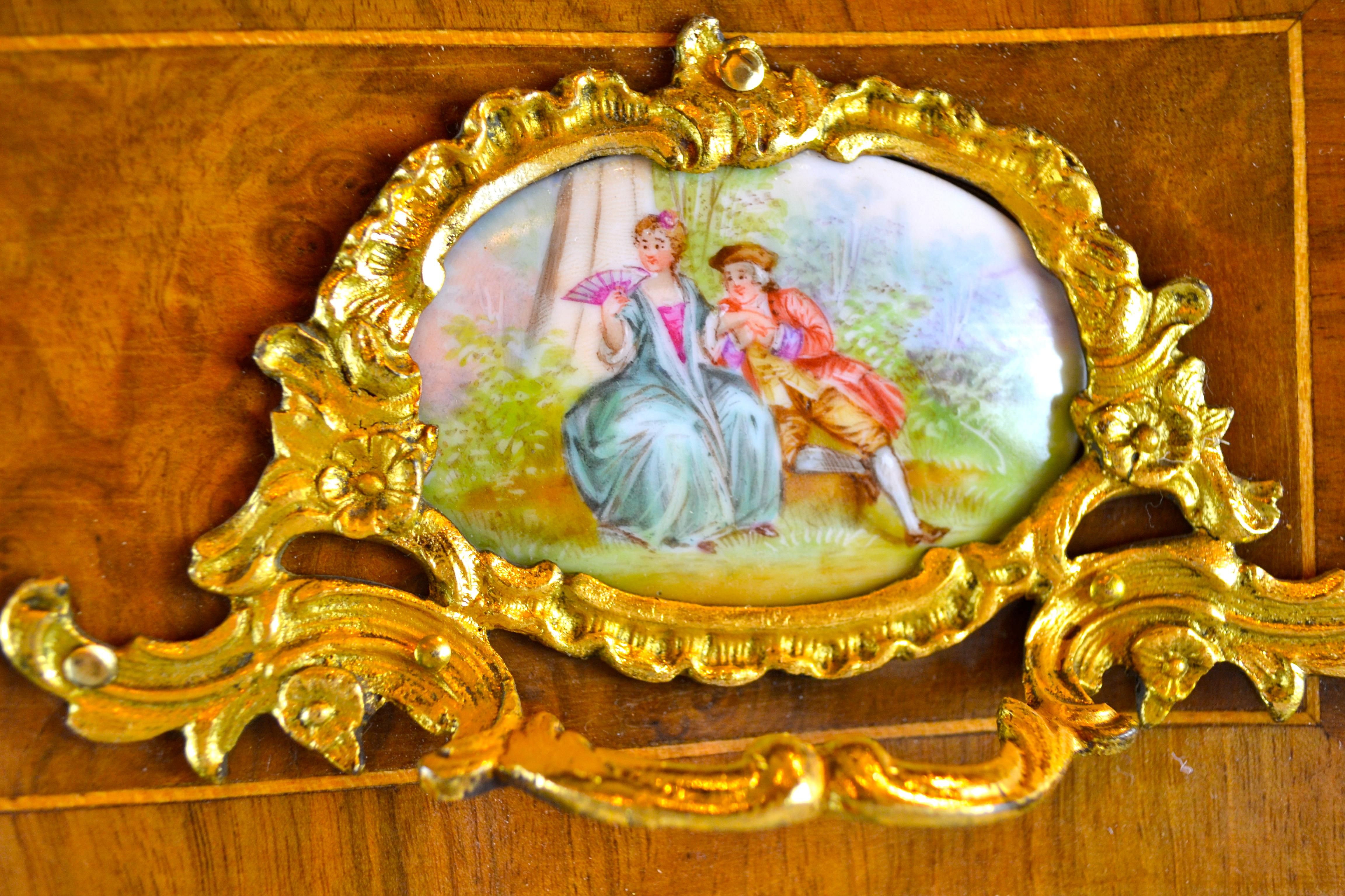 Hand-Crafted Louis XV Style Walnut Chest with Gilt Bronze Mounts and Porcelain Plaques