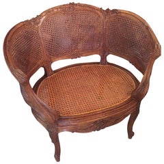 Louis XV Style Walnut Corbeille-Shaped Caned Armchair, 1900s