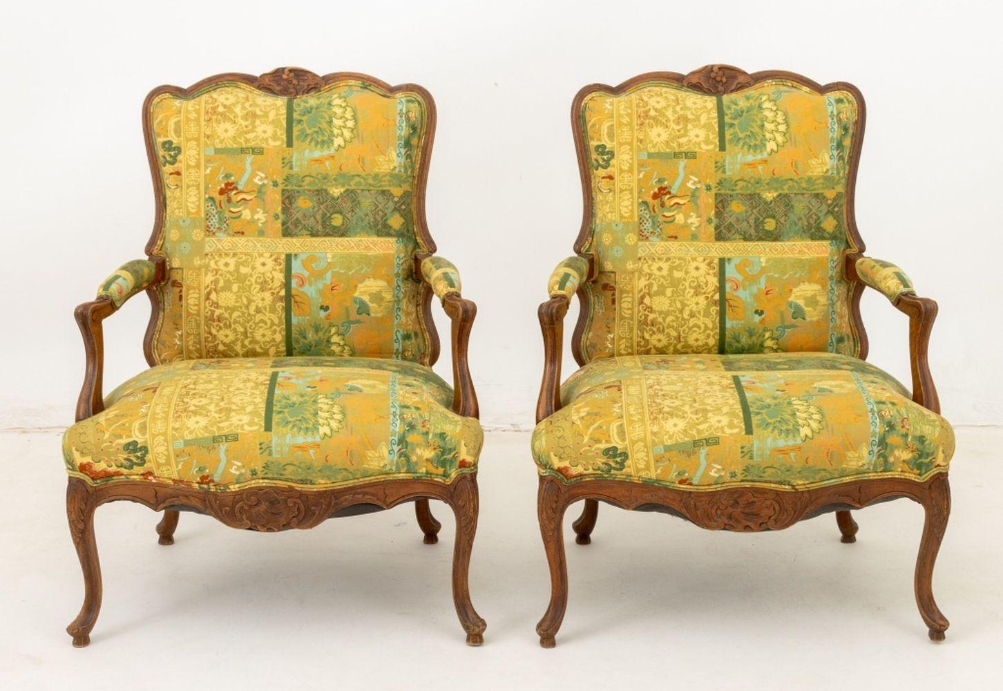Pair of Louis XV Style Walnut Fauteuils, each with upholstered back, seat, and armrests. 35.5