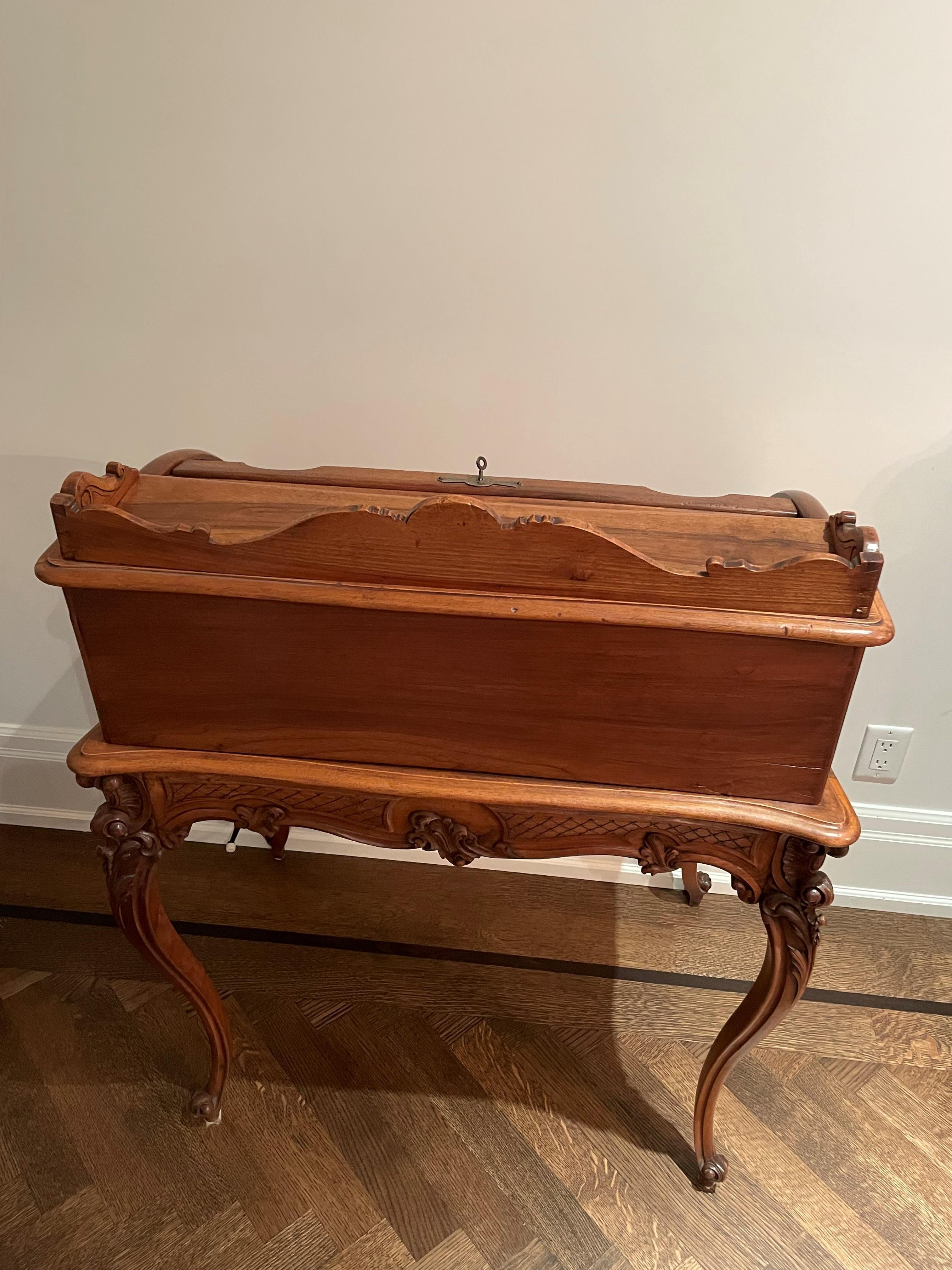 Stained Louis XV style walnut roll top desk with large drawer and upper compartments. For Sale