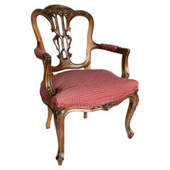 Sillón veneciano de nogal estilo Luis XV, tapicería roja