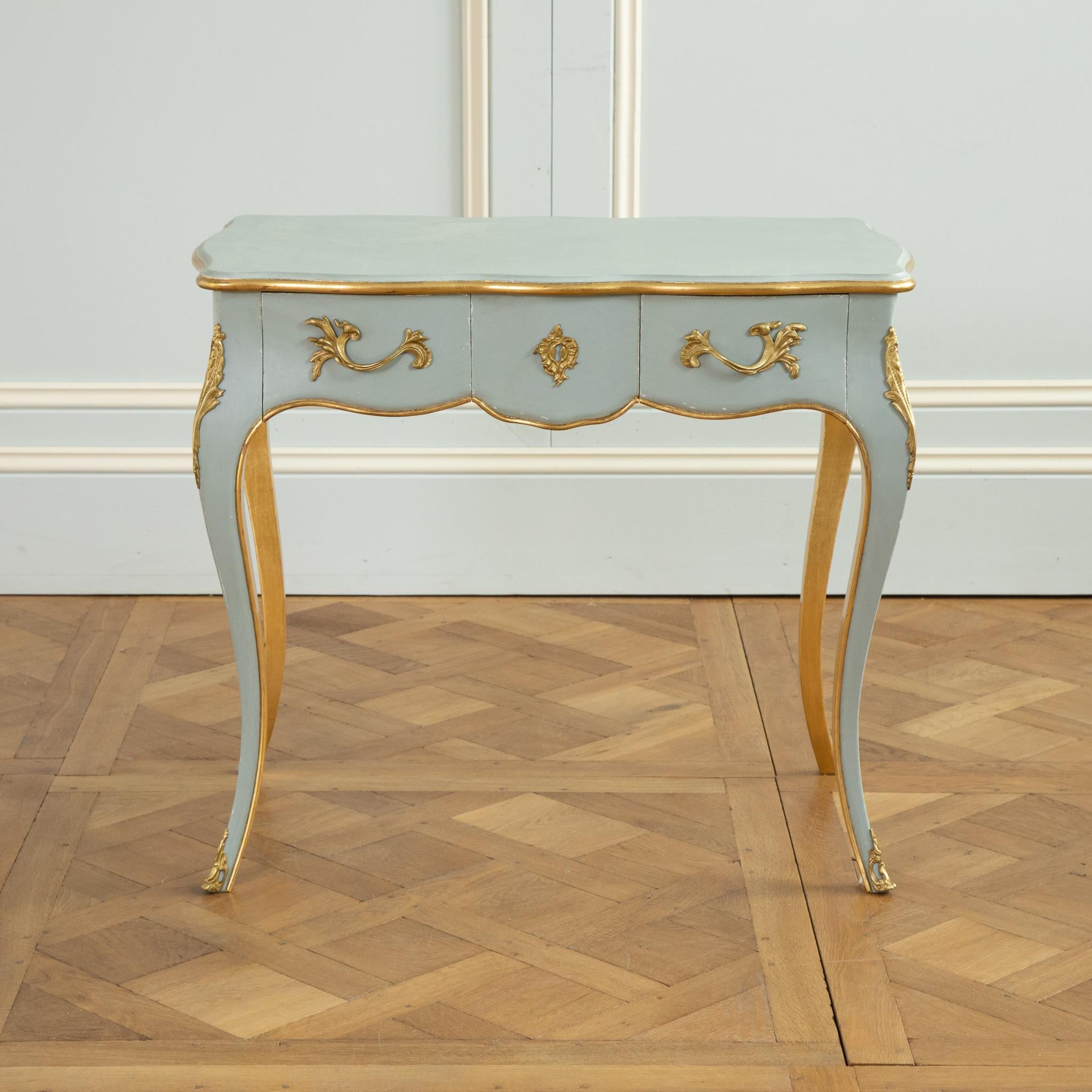Contemporary Louis XV Style Writing Desk with Serpentine Legs Painted with Gold Highlights For Sale
