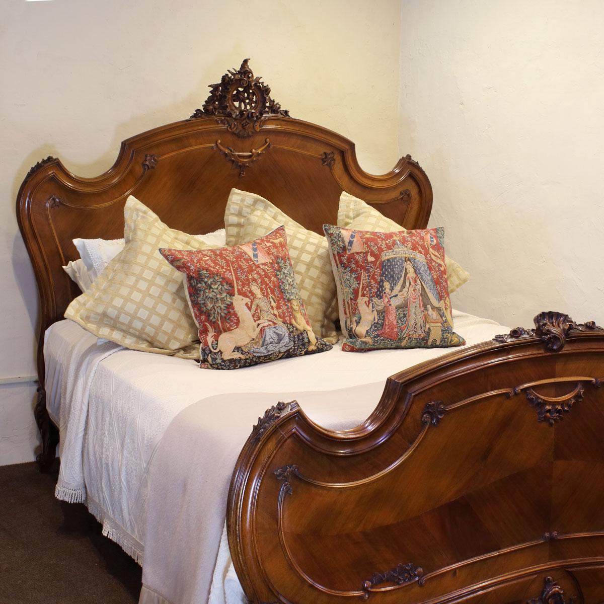 A fine Louis XV style walnut bed with carving on pediment and foot panel.

This bed accepts a British King size or American Queen size, 5ft wide (60 inches or 150cm) base and mattress set.

The price is for the bed and a firm bed base to support
