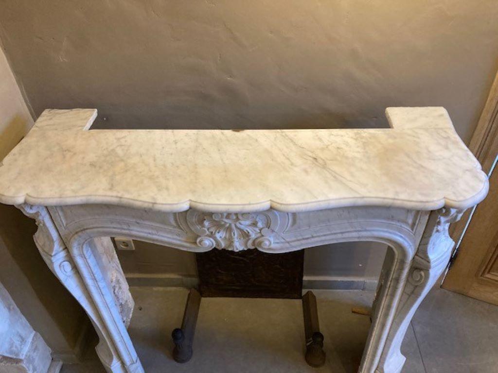 Beautiful Louis XVwhite marble fireplace mantel, dating from the 19th century.