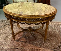 Louis XVI 19 th century Giltwood oval center table marble top
