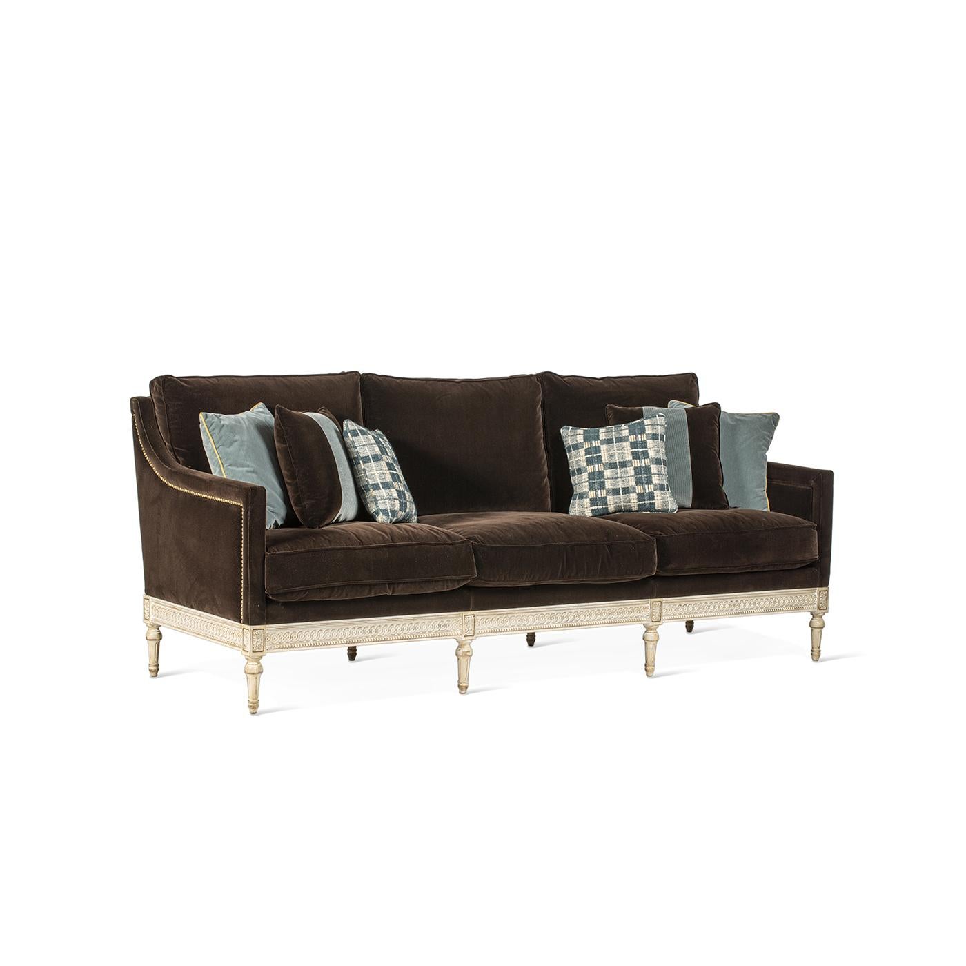 A fancy 3 seater sofa with hand-made carvings, completely built in beechwood with a padded seat and upholstered only using premium brown fabric. It is also available in a 2 seater version. The seat is 48cm tall, the armrests 66cm and the seat is