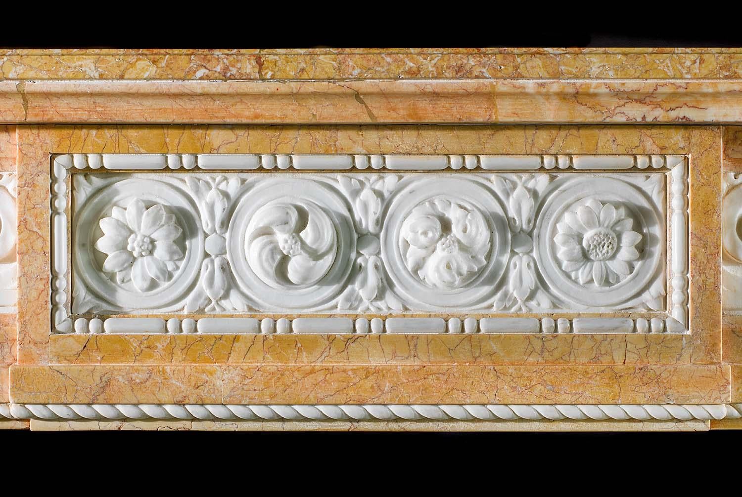 French Antique Chimneypiece Carved in Statuary and Crema Valencua Marble