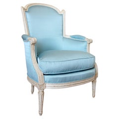 Louis XVI armchair bergere, light bleu silk, 18th century