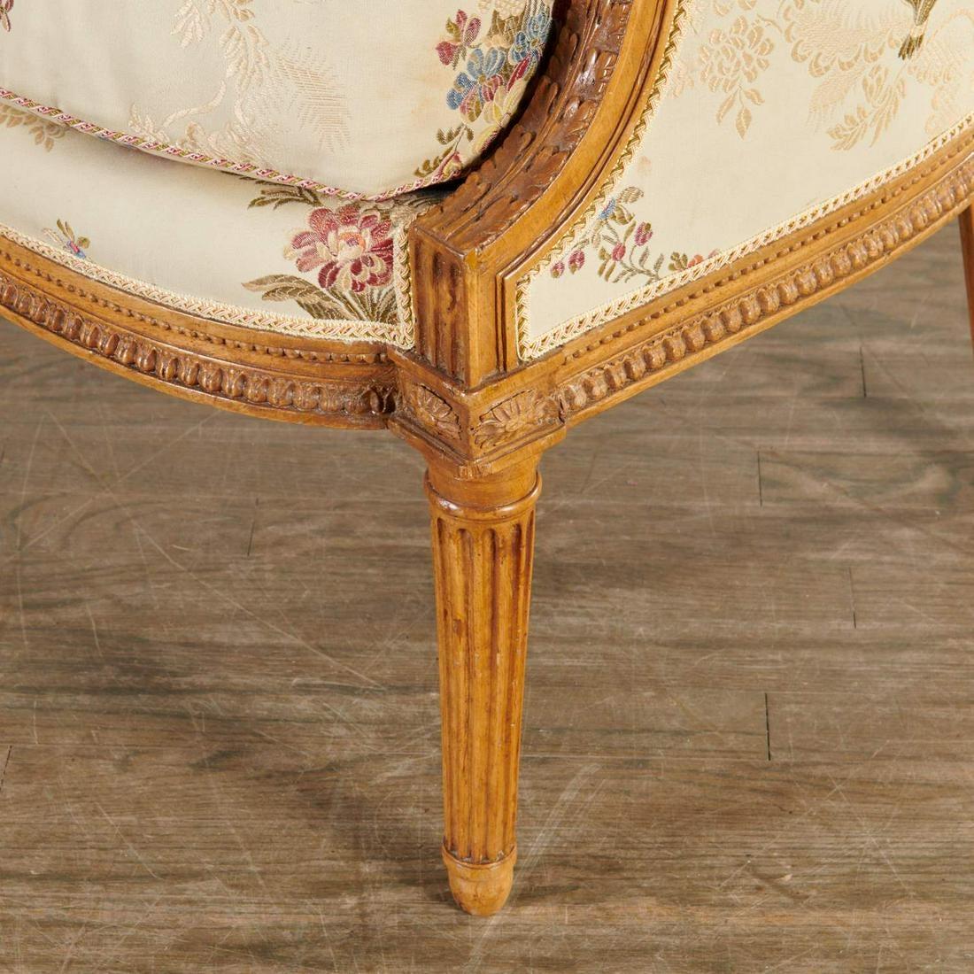 A fine Louis XVI period bergère in beech by French menuisier Sulpice Brizard, born 1735, master 1760, stamped under seat rail. Carved with acanthus leaves, beading, paterae, and fluting on the legs, the chair is an excellent example of the highest