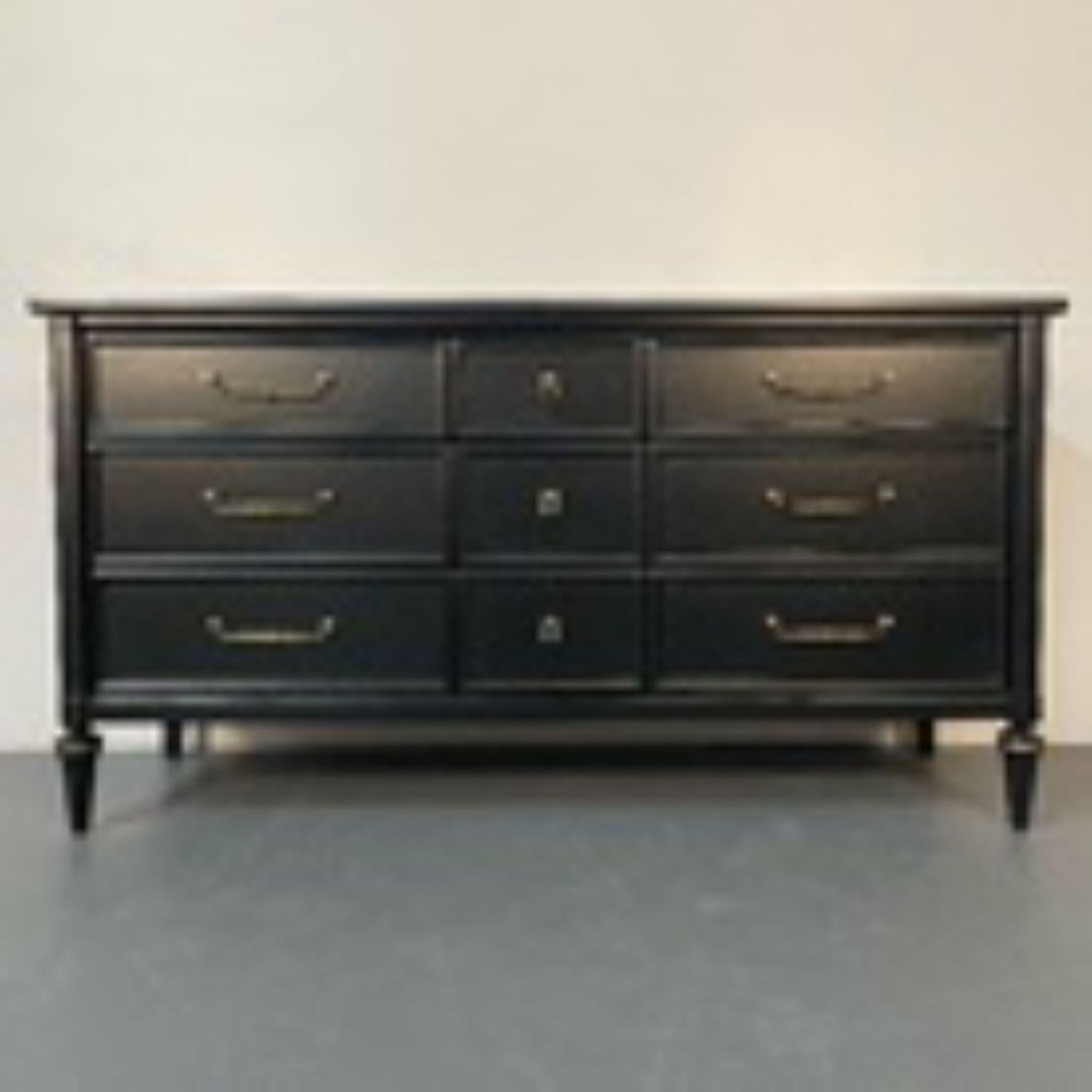 Louis XVI Black Matte Painted Dresser / Cabinet, Refinished, Brass Pulls
 
Ebony painted dresser or sideboard in the Louise XVI style having tight dovetailed drawers and brass accents. Well made case piece.
 
32.75h x 62 x 20d