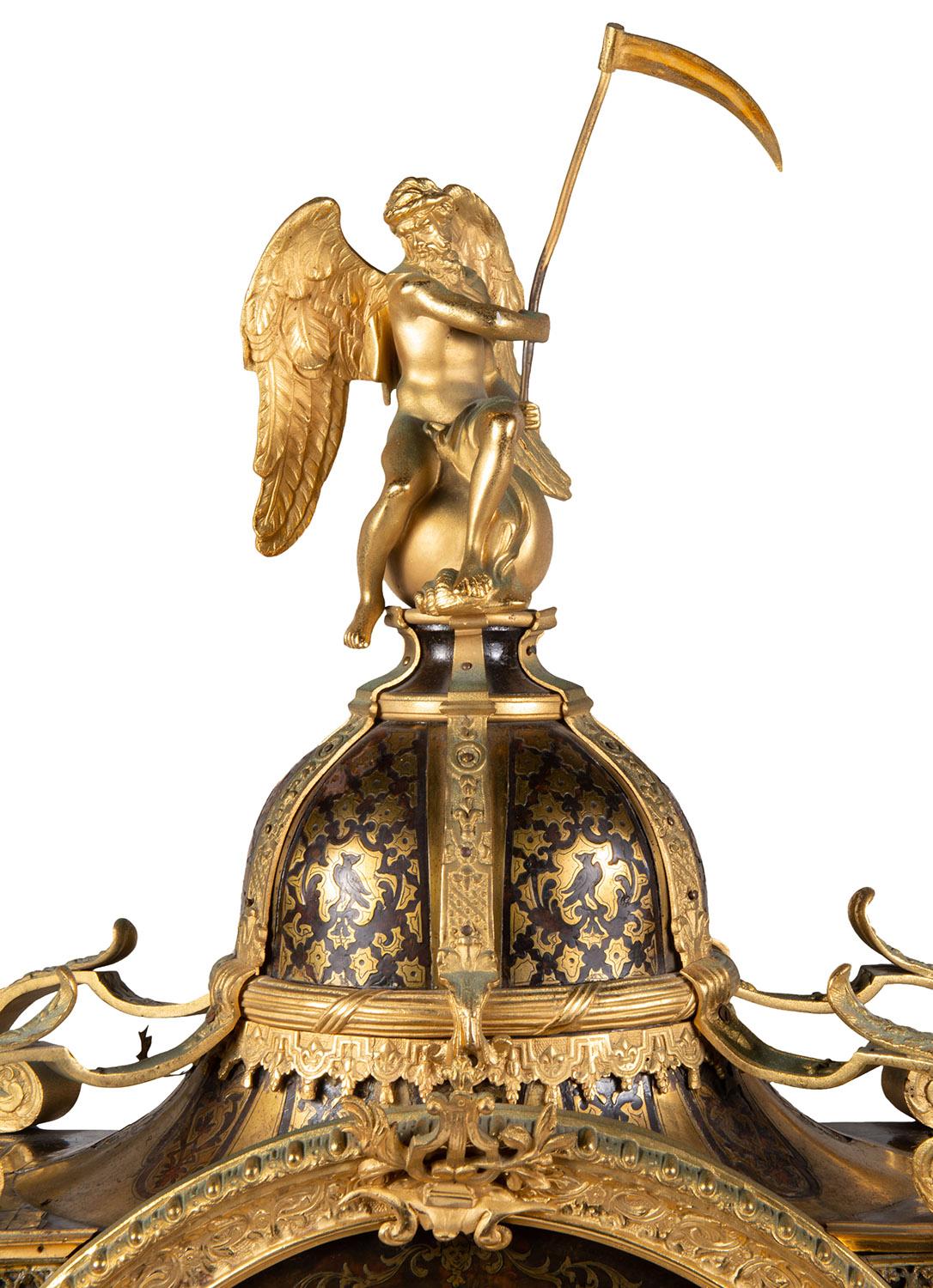 A very good quality 19th Century French Louis XVI style Boulle mantel clock, having Father Time perched above the brass inlaid dome, scrolling foliate ormolu mounts, white enamel Roman numerals to the eight day duration movement, striking on the