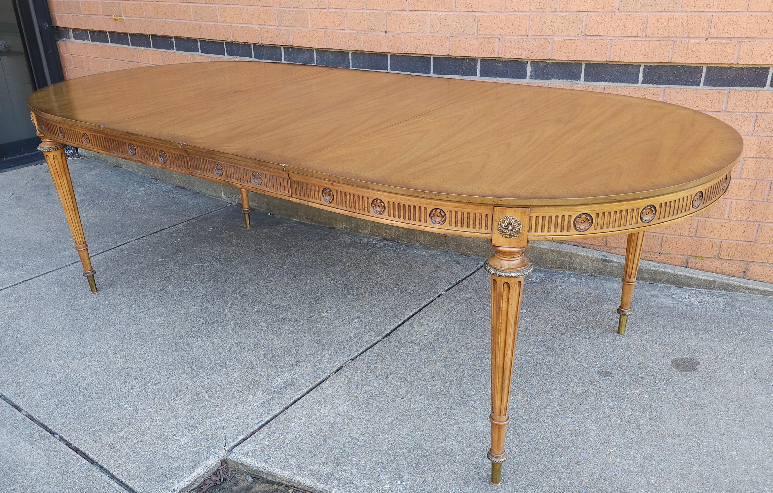 Louis XVI Style Brass Mounted French Walnut Oval Extension Dining Table With two Leaves.
Measures 98