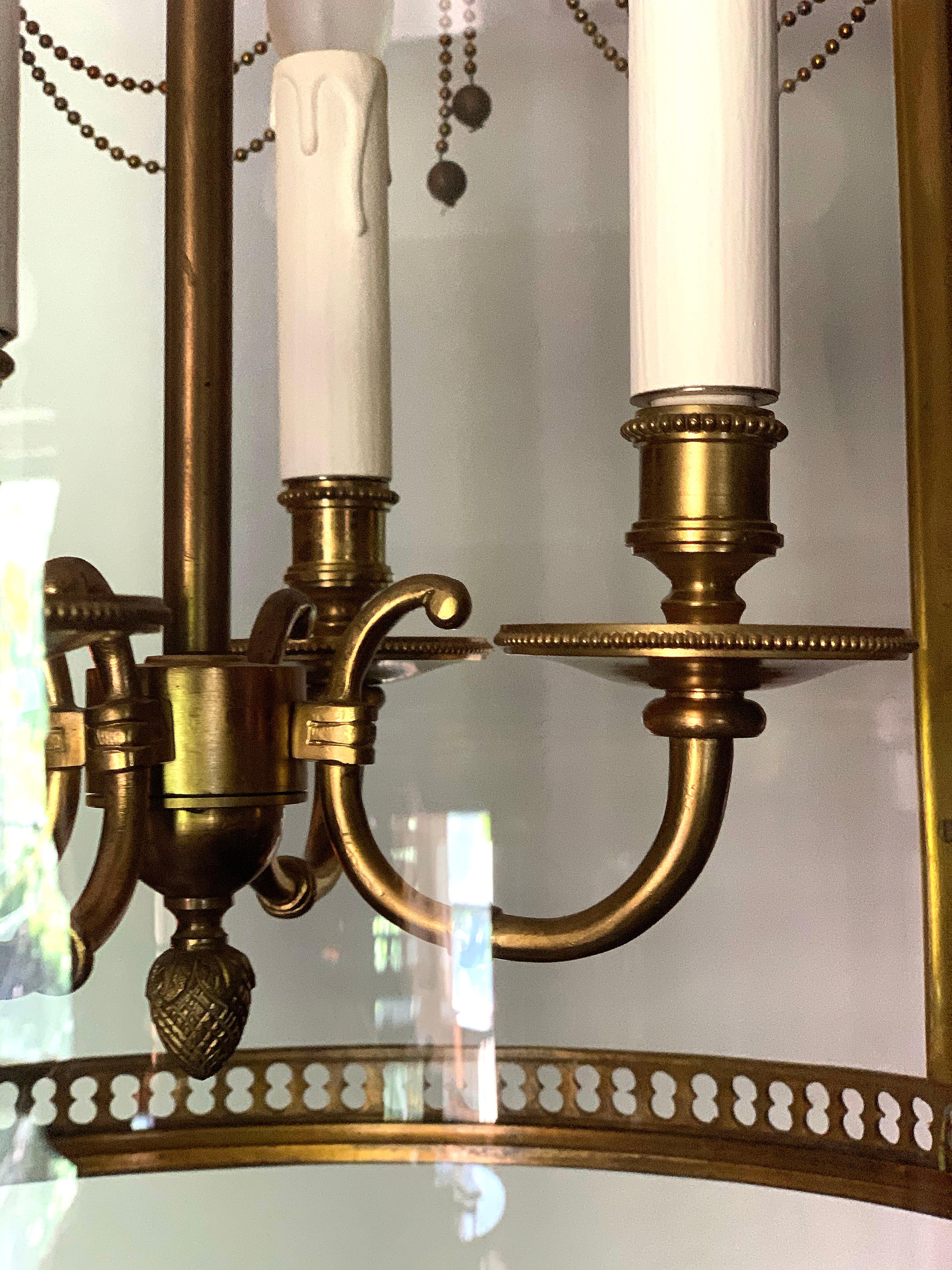 French Louis XVI Brass Round Lantern with Rams Heads and Chain Swags For Sale