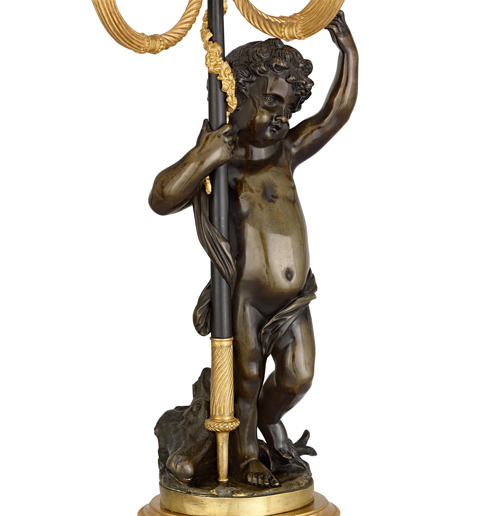 Bronzato Candelabro Luigi XVI in bronzo ormolato con putti in vendita