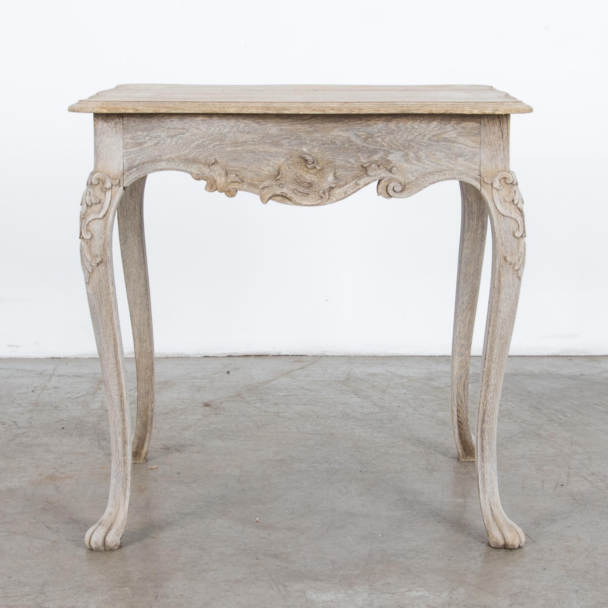 From circa 1880 France, a bleached oak table with distinctive curved legs. A classical shape first recorded in ancient Greece and China, regaining popularity in France during the Rococo period. Stylish and practical with versatile shape, charming