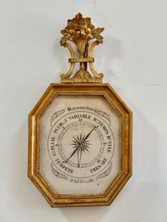 Barómetro Luis XVI tallado y dorado