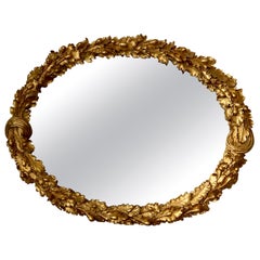 Louis XVI Style Carved Giltwood Oval Mirror with Oak Leaves and Acorns