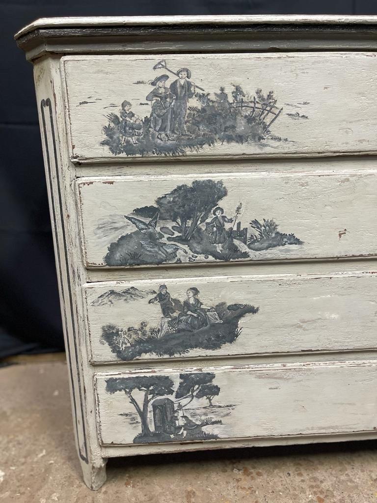 magnificent Louis CVI chest of drawers dating from the 18th century opening with 3 drawers closing with keys very beautiful patina with pretty toile de jouy patterns