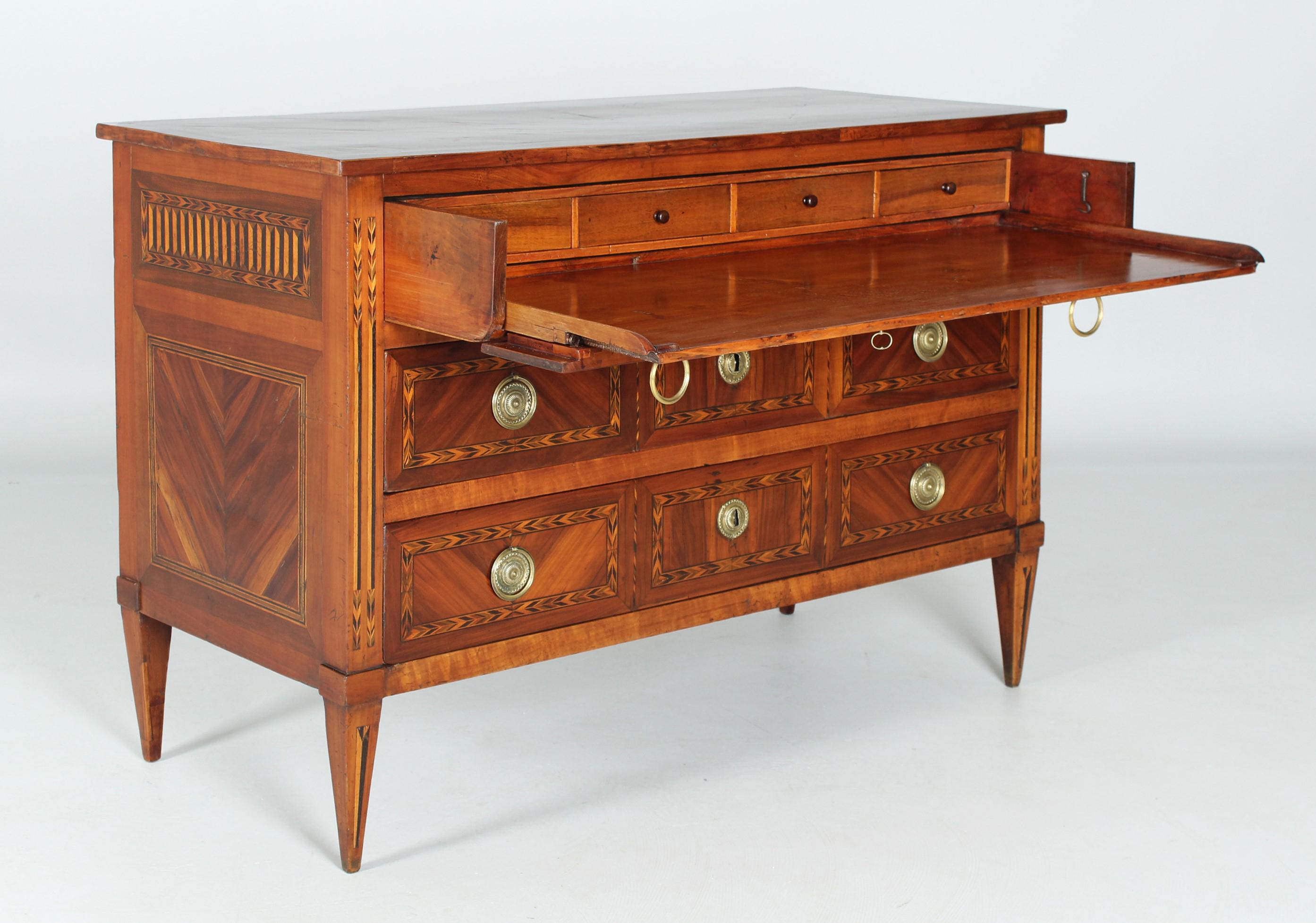 Fine Louis XVI chest of drawers with secretary compartment

Eastern France
Cherry, plum and others
Classicism around 1785

Dimensions: H x W x D: 90 x 130 x 59 cm

Description:
Three-tier piece of furniture standing on pointed legs with impressive
