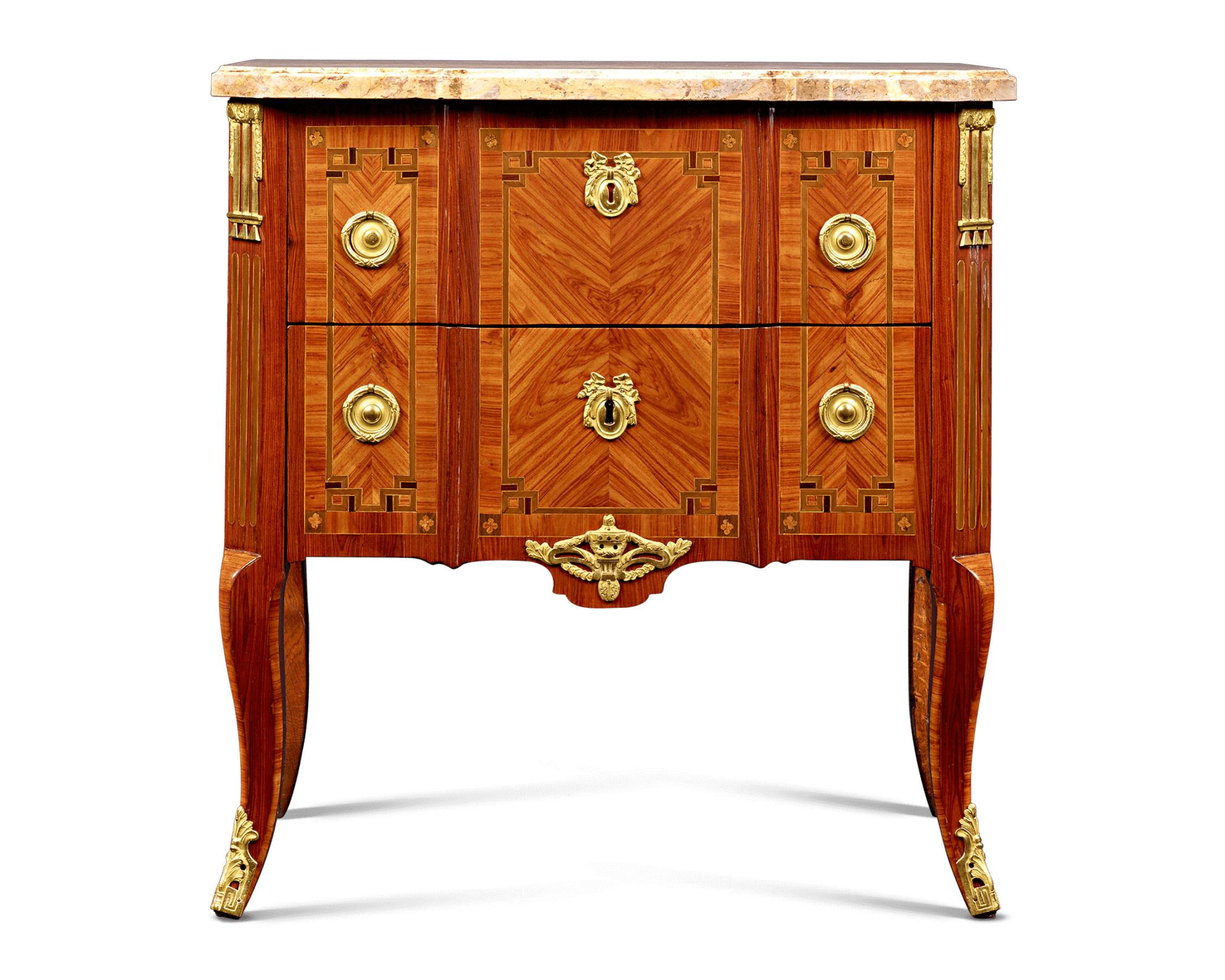 Matchless style and high-quality craftsmanship are the hallmarks of Pierre Roussel's furniture, and this exceptional Louis XVI-era commode epitomizes this master craftsman's skill. Crafted of rosewood veneer with a violet wood frame and intricate